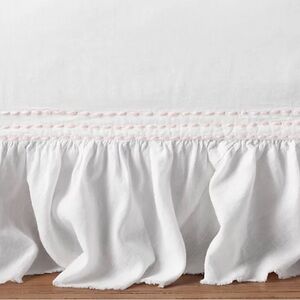Restoration Hardware Viole White Crib Skirt. Stitching is pink